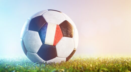 Football,soccer,ball,with,flag,of,france,on,grass.,french