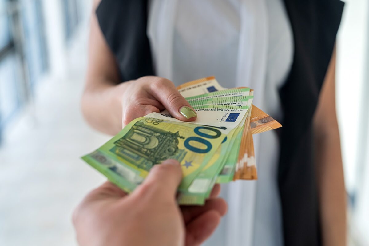 Hands,of,a,young,beautiful,girl,hand,over,a,large