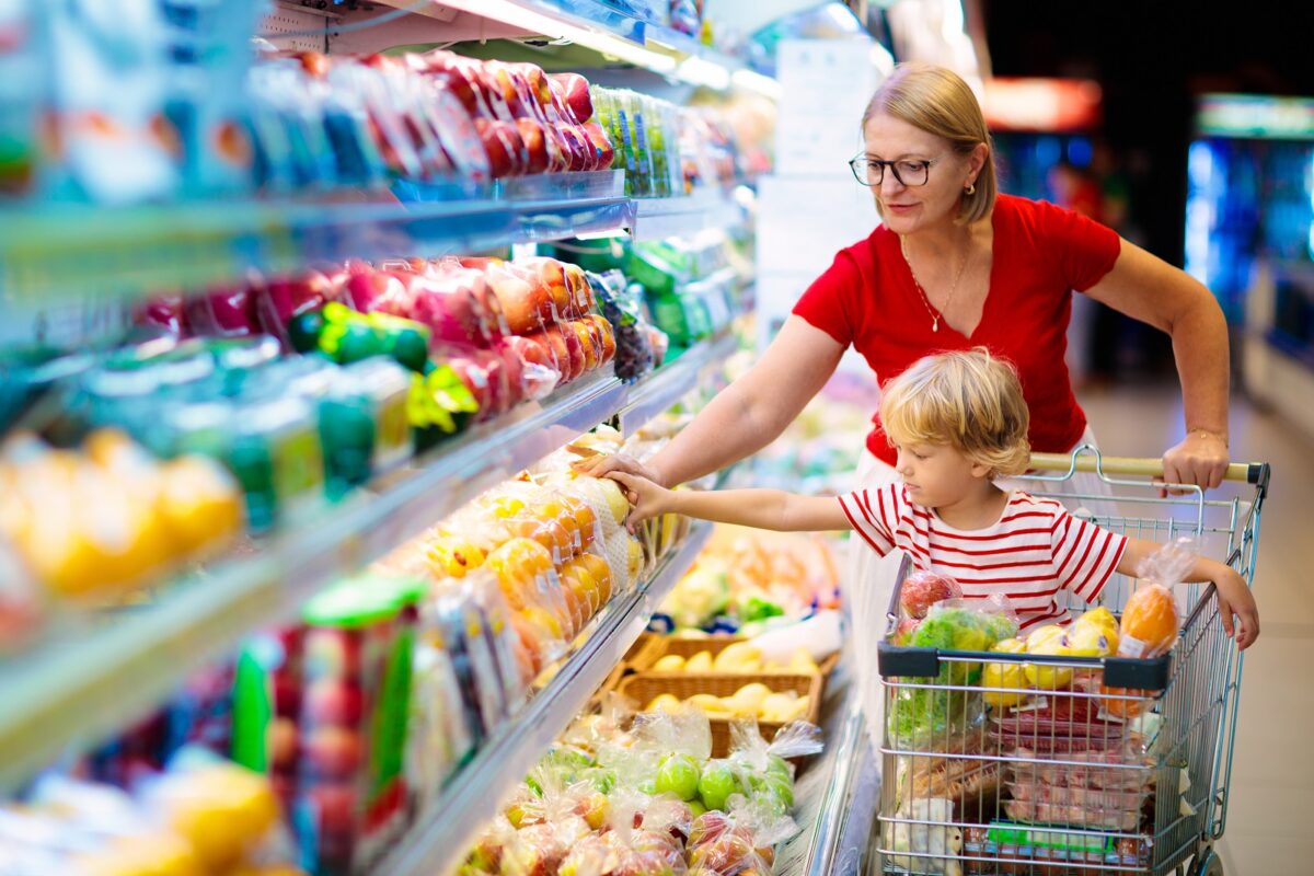 Shopping,with,kids.,mother,and,child,buying,fruit,in,supermarket.