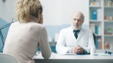 Doctor,giving,bad,news,to,a,patient,,the,woman,is