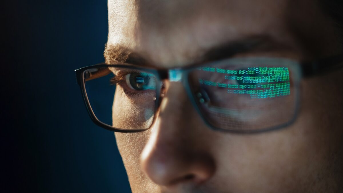 Close Up,portrait,of,focused,software,engineer,wearing,eyeglasses,looking,at