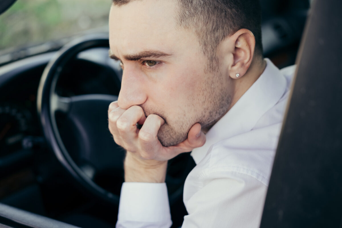 Stressed,businessman,,furious,driver,in,his,car