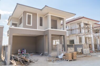 Construction,residential,new,house,in,progress,at,building,site,housing