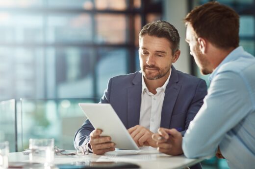 Teamwork,meeting,,tablet,and,business,people,in,office,workplace.,collaboration,