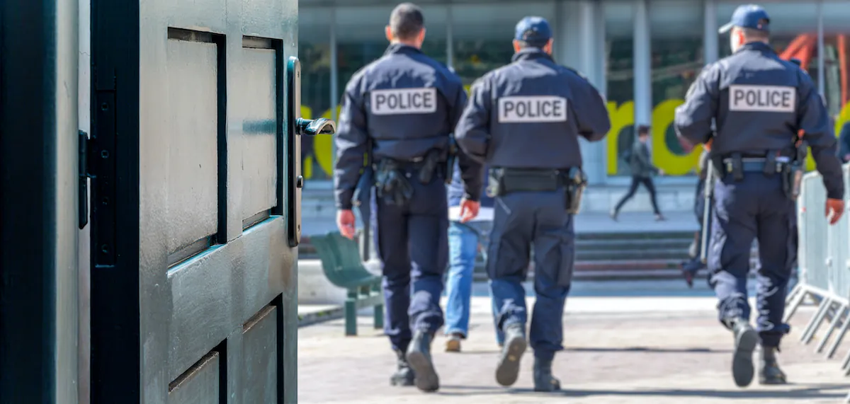 Opened,door,concept,with,a,police,patrol,in,the,background