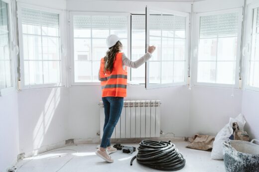 Inspector,or,architect,professional,woman,checking,windows,at,construction,site.