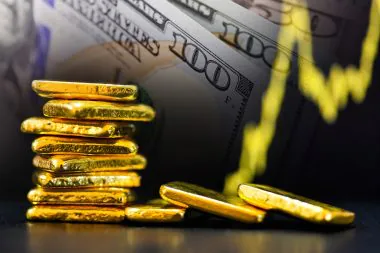 Gold,bars,and,us,dollar,bill,banknotes,background.,online,concept