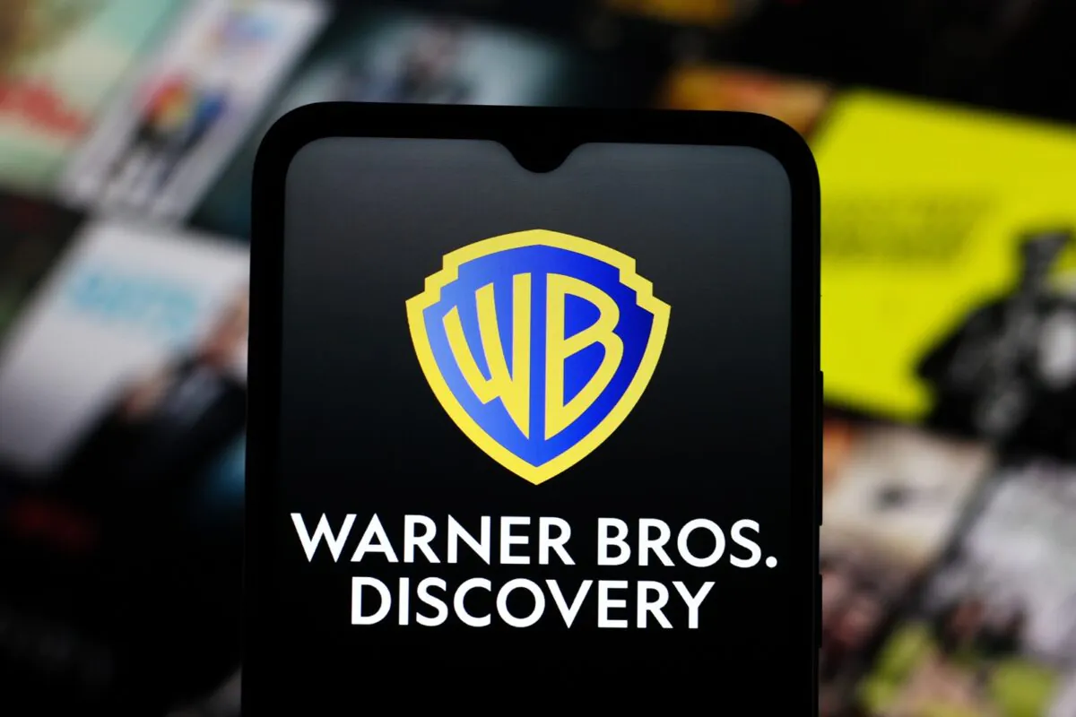 The,warner,bros,discovery,logo,is,seen,displayed,on,a