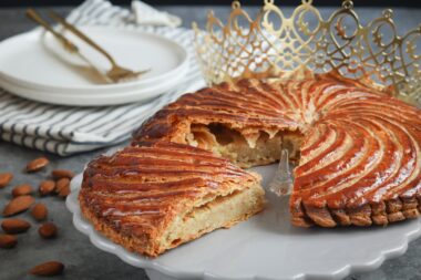 A,piece,of,traditional,french,galette,des,rois,with,golden