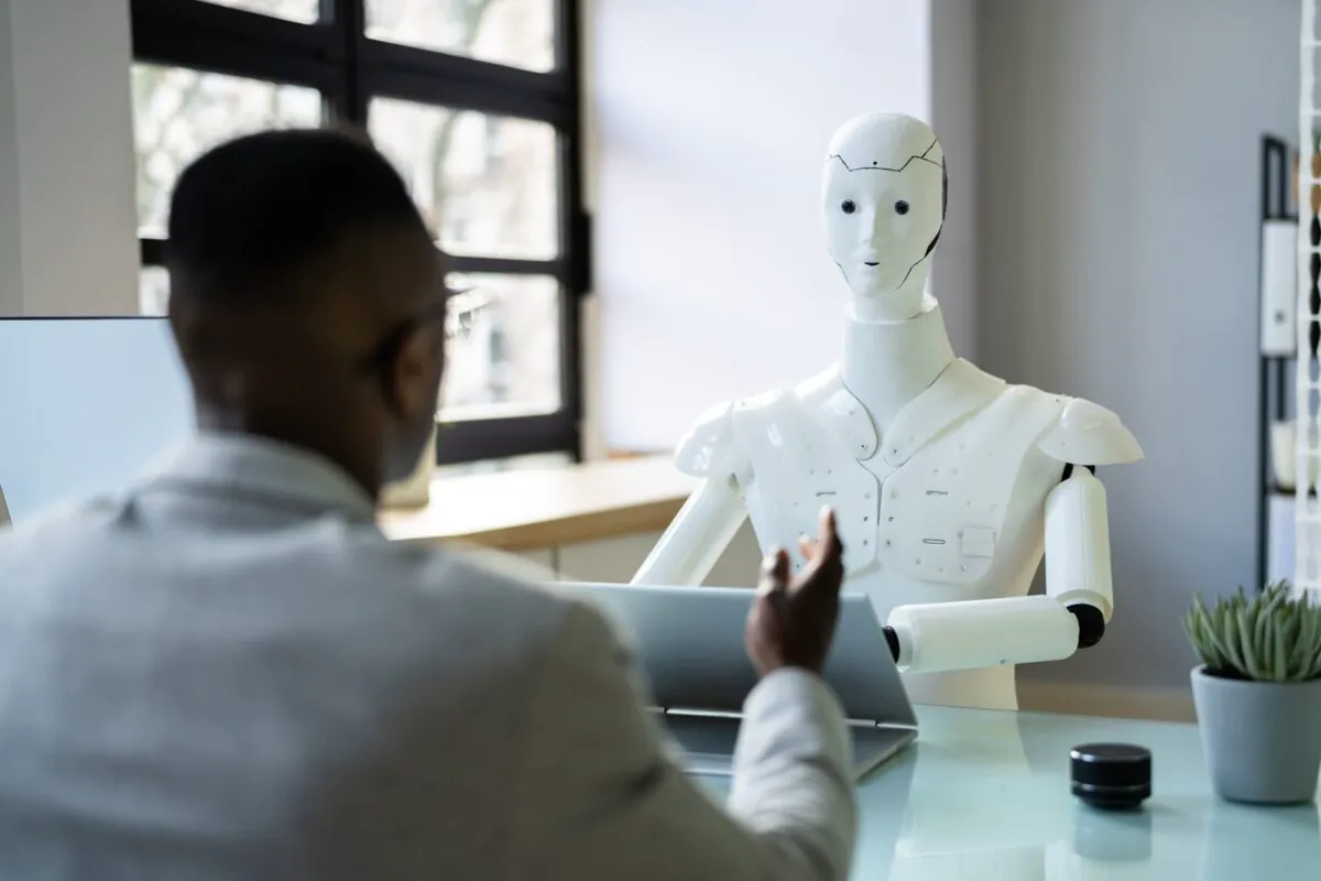 African,men,at,interview,with,ai,robot,machine