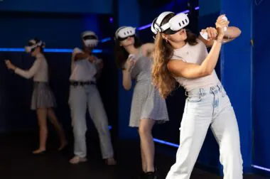 Young,woman,fully,immersed,in,game,using,vr,headset,and