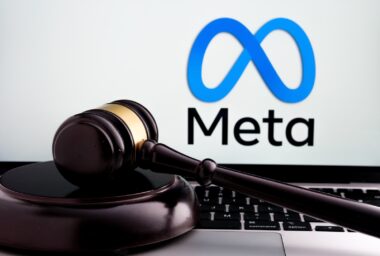 Court,gavel,placed,on,laptop,with,blurred,meta,platforms,company