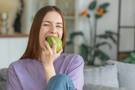 Healthy,lifestyle,concept.,beautiful,young,caucasian,woman,biting,fresh,green