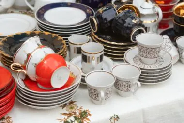 Vintage,porcelain,dishes,and,tea,cups,with,decorative,golden,details