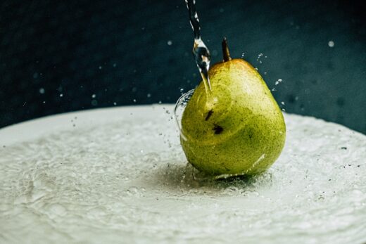 "Un fruit poire verte, pour comprendre comment fonctionne le per et découvrir ses bienfaits."