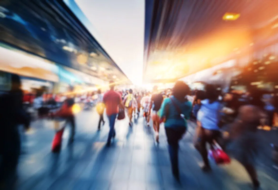 Blurry,image,of,a,crowd,of,people,walking,in,a
