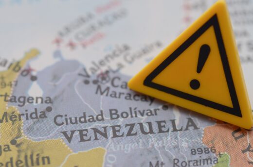 Venezuela,crisis,warning,sign,on,map,,travel,advisory,and